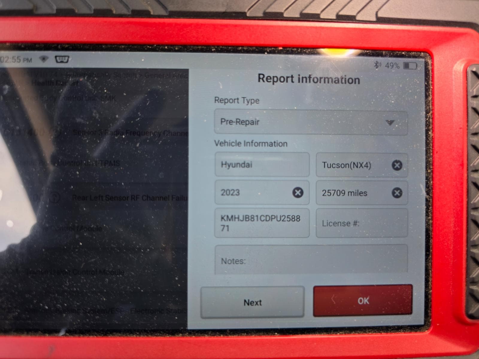 Odometer, scanner report and vehicle identification photo slot 2